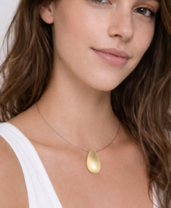 Colgante en Oro Matizado. Colección Musclus