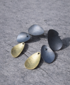 Earrings in Gold and Silver. Mussels Collection